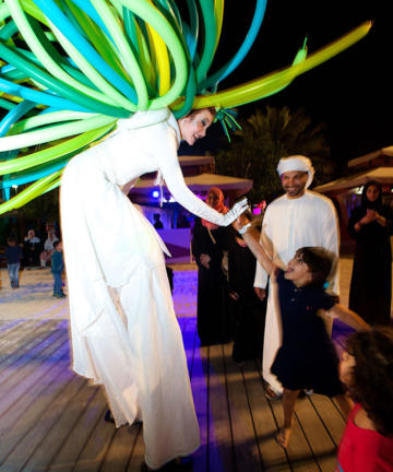 Stilt walker in balloon costume