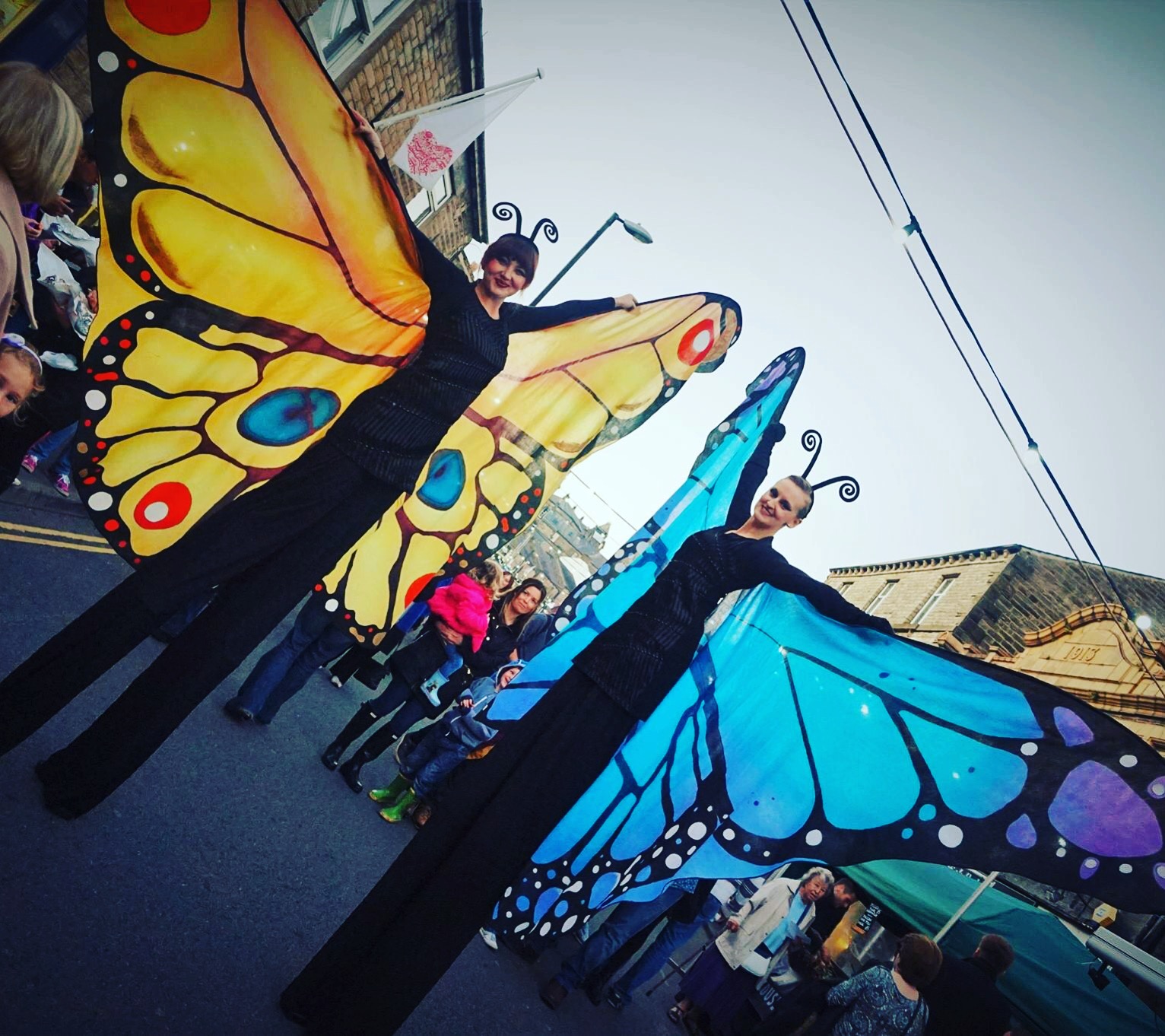 butterfly stilt walkers