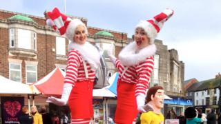 Elf stilt walkers