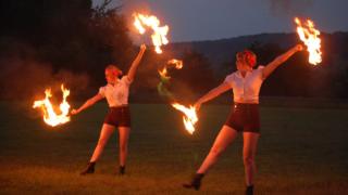 Fire fans dancing