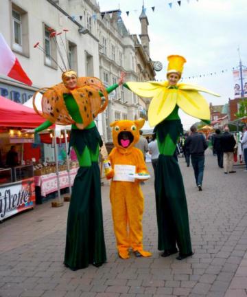 Flower rangers on stilts