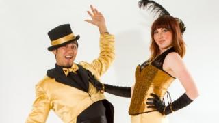 Helter Skelter Gold formal stilt walkers duo