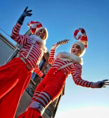 Helter Skelter Theme Christmas Elves on stilts