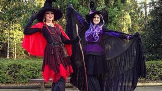 Helter Skelter Theme Halloween Stilt witch duo