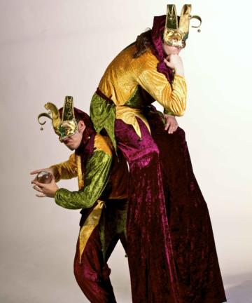 Helter Skelter Medieval theme jester stilt walkers