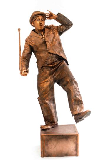 Bronze living statue performer