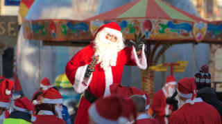 Helter Skelter Santa Stilt Walker