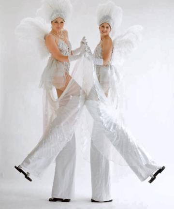 White and silver showgirls 3 on stilts