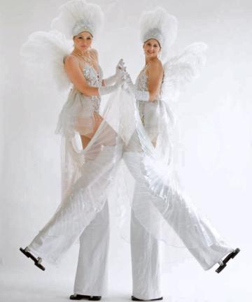 White and silver showgirls 3 on stilts