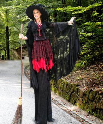 Helter Skelter Halloween theme Witch stilt walkers