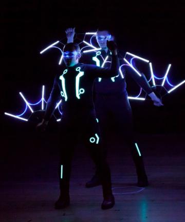 stage show performers do lights dance